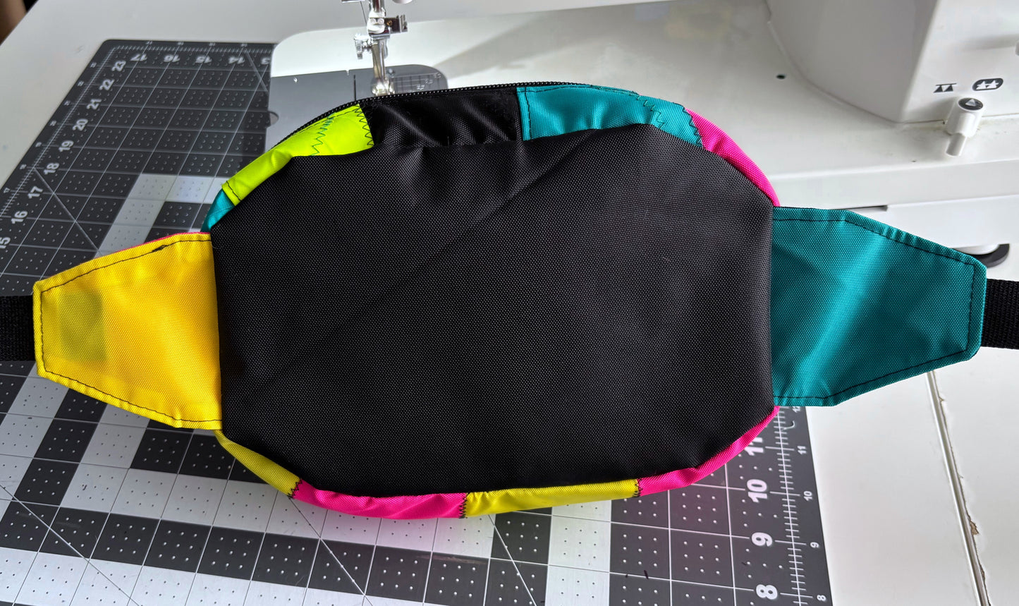 neon pill belly bag